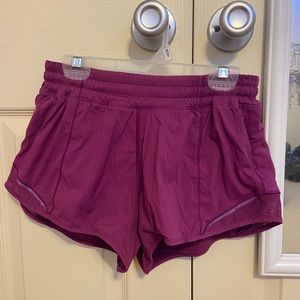 size 6 purple lululemon shorts 2.5 length